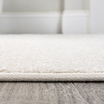 Haze Solid Low-pile Area Rug Cream